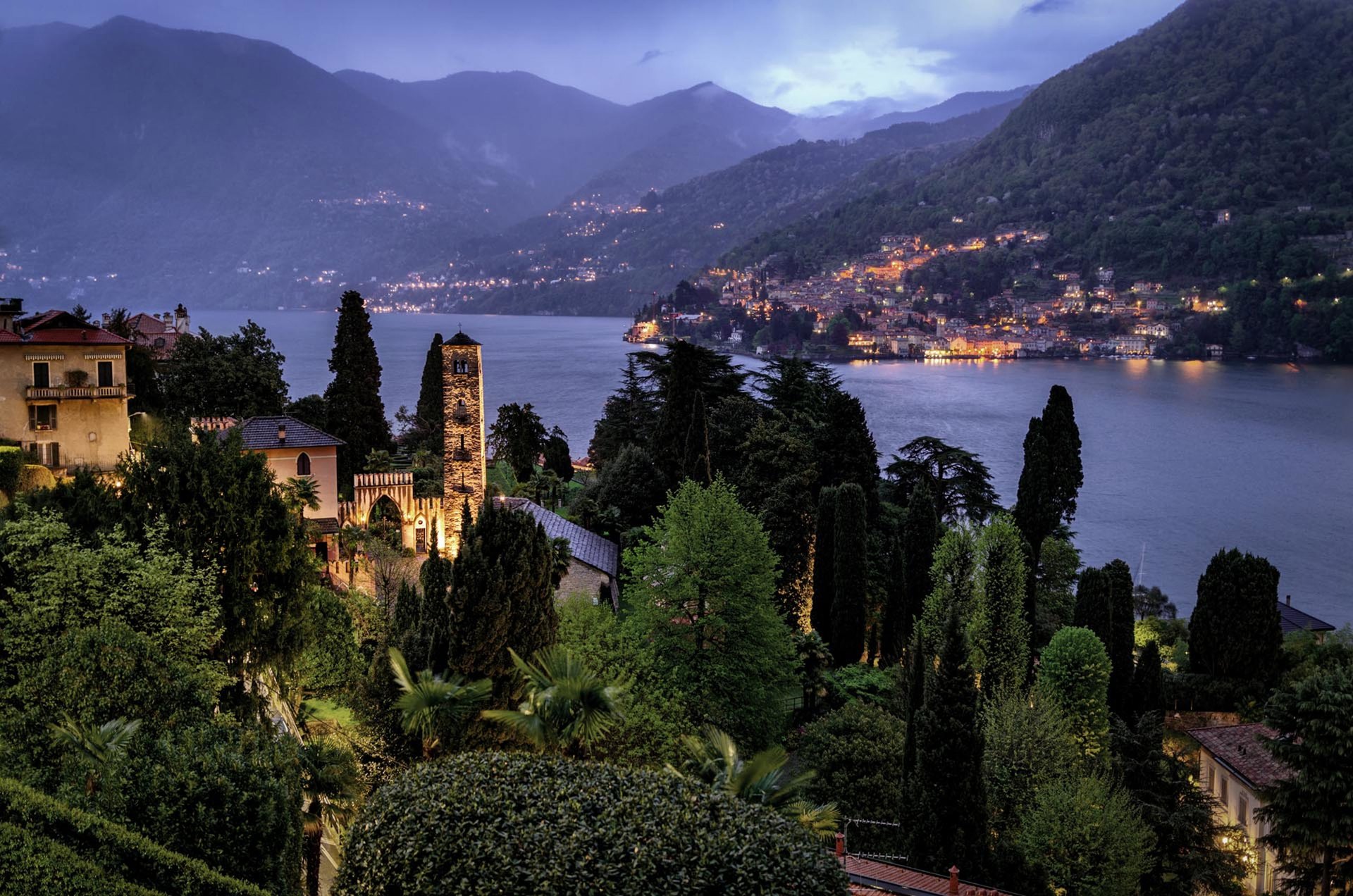 Passalacqua’s gardens and Moltrasio at dusk, with the lights of the eastern shore across the lake
