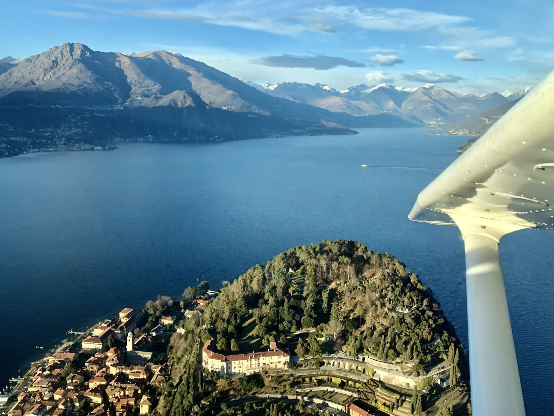 Bellagio’s peninsula and the lake from a Como Seaplanes flight, under the wing