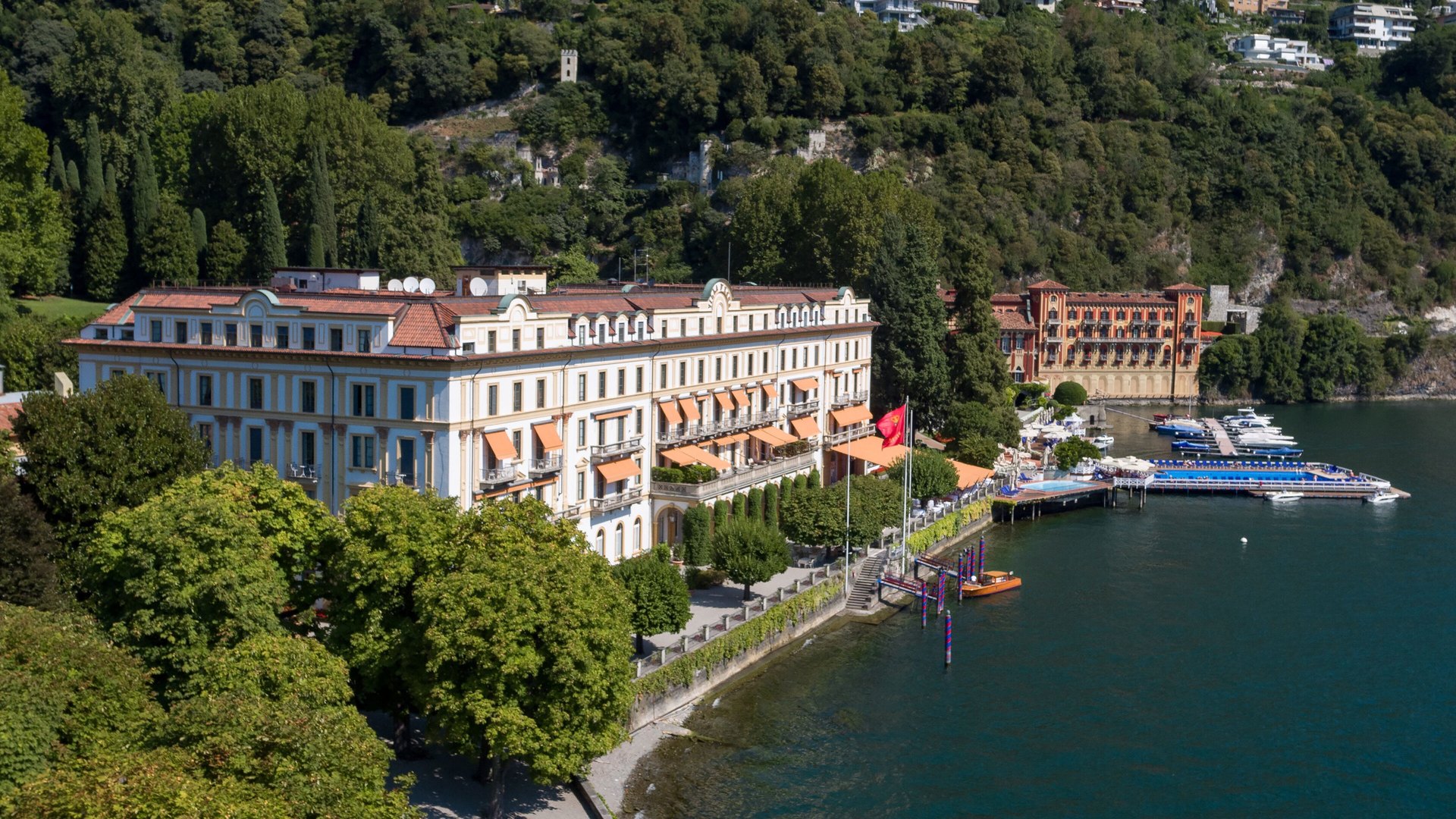 Villa d’Este on the shore at Cernobbio from the air, with its gardens, landing stage and pool on the lake